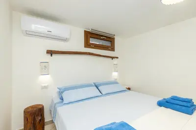 Letto o letti in una camera di Levante a pochi passi dal mare