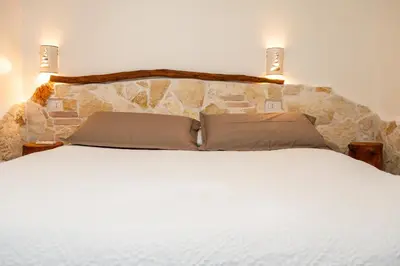 Letto o letti in una camera di GRECALE a pochi passi dal mare