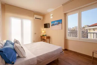 Letto o letti in una camera di Cagliari Magica bellissimo appartamento & suite in centro