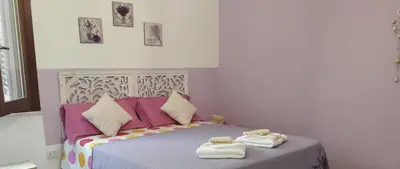 Letto o letti in una camera di Angolo Verde