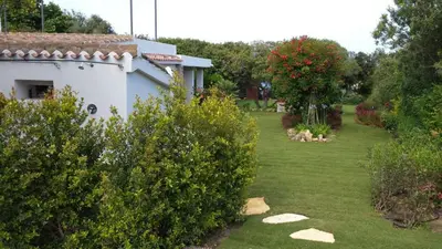 Giardino di VILLA MILVIO con accesso privato in spiaggia