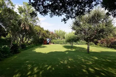 Giardino di VILLA MILVIO con accesso privato in spiaggia