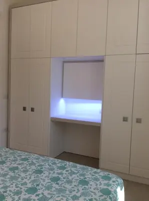 Letto o letti in una camera di VILLA MILVIO con accesso privato in spiaggia