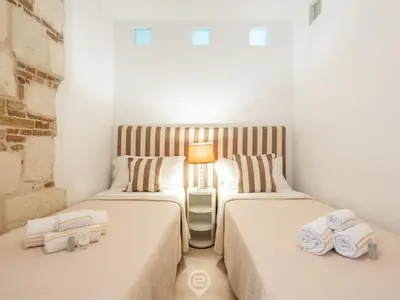 Letto o letti in una camera di Charming apartment in the City center