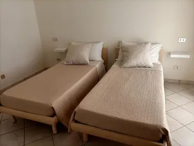 Letto o letti in una camera di casa vacanze