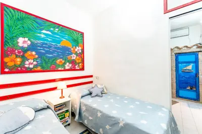 Letto o letti in una camera di Free Beach Holiday Home