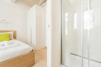 Letto o letti in una camera di A Gem in the City