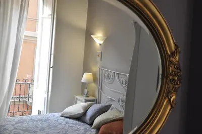 Letto o letti in una camera di New Romantic Suite