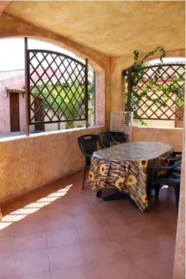 Area soggiorno di Residence Il Borgo di Porto Corallo