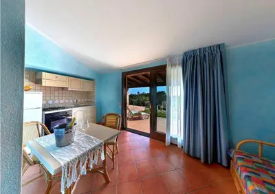 TV o dispositivi per l'intrattenimento presso Residence Il Borgo di Porto Corallo