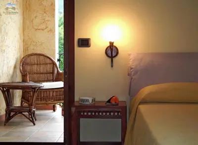 Letto o letti in una camera di Hotel La Corte Rosada