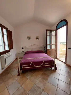 Letto o letti in una camera di Hotel La Corte Rosada