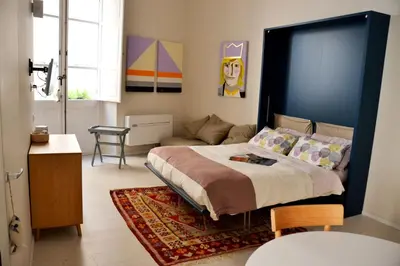 Letto o letti in una camera di casa minù lamarmora