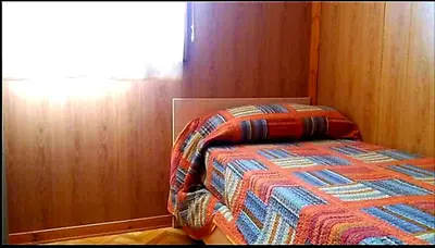 Letto o letti in una camera di Casa Vacanza Gaia Relax Pula