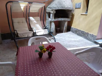Letto o letti in una camera di Appartamento con Barbecue