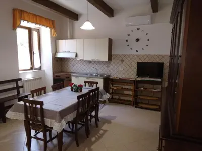 Cucina o angolo cottura di Appartamento con Barbecue