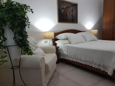 Letto o letti in una camera di Marco's house