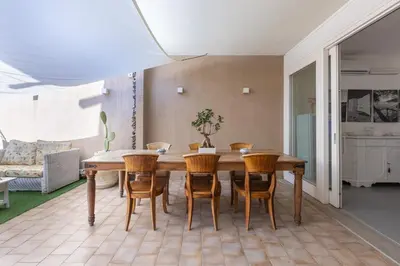 Area soggiorno di Domu Ajaju Guest House
