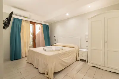 Letto o letti in una camera di Domu Ajaju Guest House
