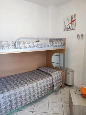Letto o letti in una camera di Casa DàCà