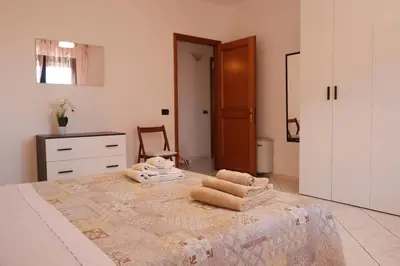 Letto o letti in una camera di Casa DàCà