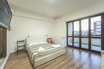 Letto o letti in una camera di Le stanze al PORTO
