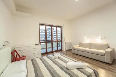 Letto o letti in una camera di Le stanze al PORTO