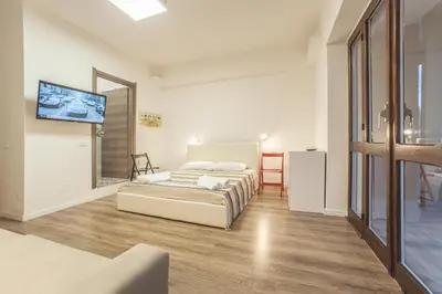 Letto o letti in una camera di Le stanze al PORTO