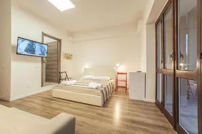 Letto o letti in una camera di Le stanze al PORTO