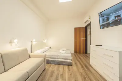 Letto o letti in una camera di Le stanze al PORTO