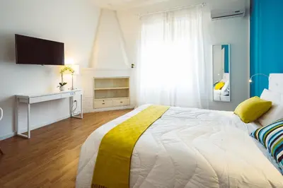 Letto o letti in una camera di Bluemoon Sardinia