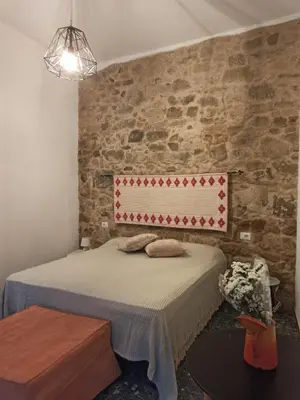 Letto o letti in una camera di Piazza San Giorgio