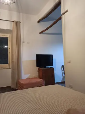 Letto o letti in una camera di Piazza San Giorgio