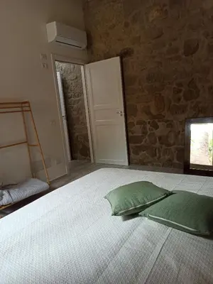 Letto o letti in una camera di Piazza San Giorgio