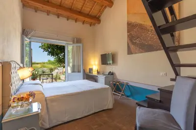 Letto o letti in una camera di Aquae Sinis Albergo Diffuso