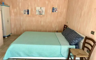 Letto o letti in una camera di Villa Bianca BB e Apartments