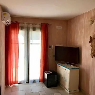 TV o dispositivi per l'intrattenimento presso Villa Bianca BB e Apartments