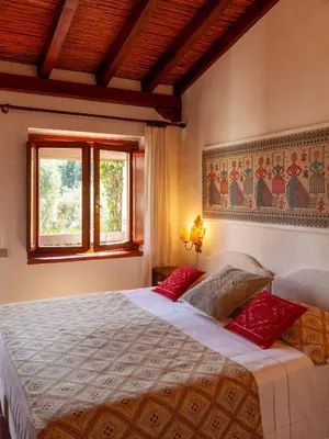 Letto o letti in una camera di Nora Club Hotel & Spa