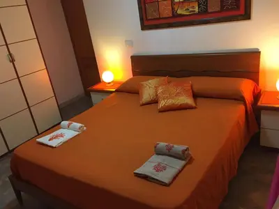 Letto o letti in una camera di VILLA VITTORIA with LARGE PRIVATE HEATED SWIMMING POOL COMPLETE with JACUZZI FOR EXCLUSIVE USE , SEA and BEACH VIEW, 150 METERS FROM THE BEACH, POOL SURFACE 60 mq , 645 sq ft, POOL DEPTH 140 cm ,55 inches, PARKING AND WIFI FREE