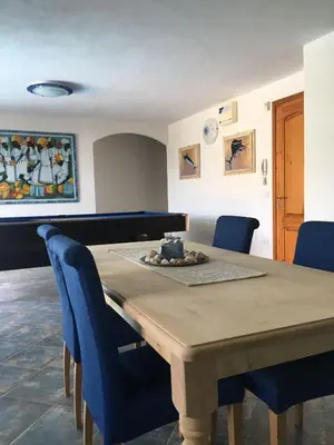 Area soggiorno di VILLA VITTORIA with LARGE PRIVATE HEATED SWIMMING POOL COMPLETE with JACUZZI FOR EXCLUSIVE USE , SEA and BEACH VIEW, 150 METERS FROM THE BEACH, POOL SURFACE 60 mq , 645 sq ft, POOL DEPTH 140 cm ,55 inches, PARKING AND WIFI FREE