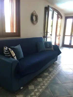 Area soggiorno di VILLA VITTORIA with LARGE PRIVATE HEATED SWIMMING POOL COMPLETE with JACUZZI FOR EXCLUSIVE USE , SEA and BEACH VIEW, 150 METERS FROM THE BEACH, POOL SURFACE 60 mq , 645 sq ft, POOL DEPTH 140 cm ,55 inches, PARKING AND WIFI FREE