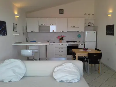 Cucina o angolo cottura di Appartamento Elegante E Panoramico Con Splendida Vista Mare