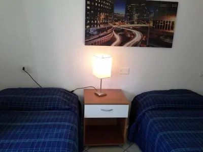 Letto o letti in una camera di Appartamento Elegante E Panoramico Con Splendida Vista Mare
