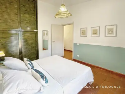 Letto o letti in una camera di Casa Lia