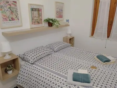 Letto o letti in una camera di Casa Gianfabio