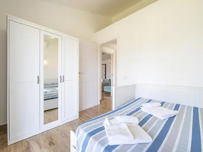 Letto o letti in una camera di Villa Lunu