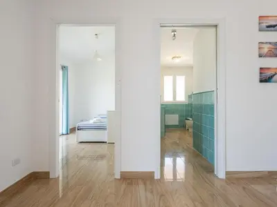 Letto o letti in una camera di Villa Lunu