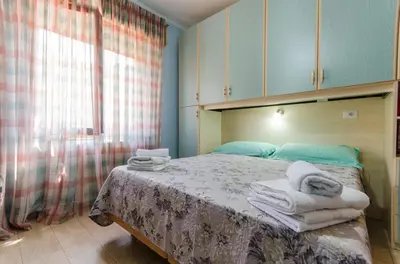 Letto o letti in una camera di Vacanze a Loceri