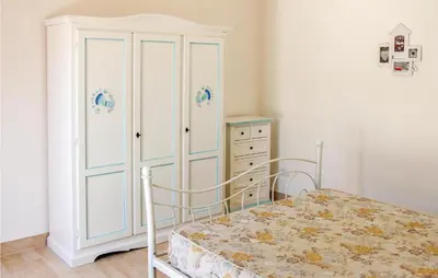Letto o letti in una camera di Rei Sole Uni 6 Pool