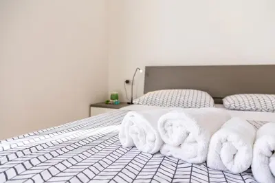 Letto o letti in una camera di Alexander B&B